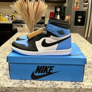 NWT Air Jordan 1 Retro High OG University Blue/White/Black
Size Men’s 12